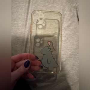 3 iphone 11 phone cases (one frog case and 2 dino cases)